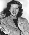 candid shot of Rita in 1955