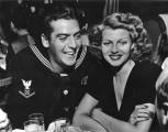 1942 picture of Rita with Victor Mature, whom she was dating at the time, before Orson swept her off her feet